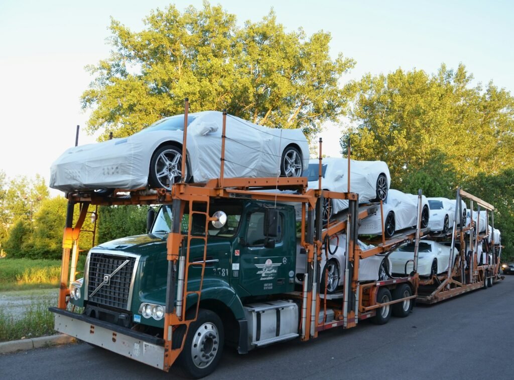 Open car carrier driving on the interstate